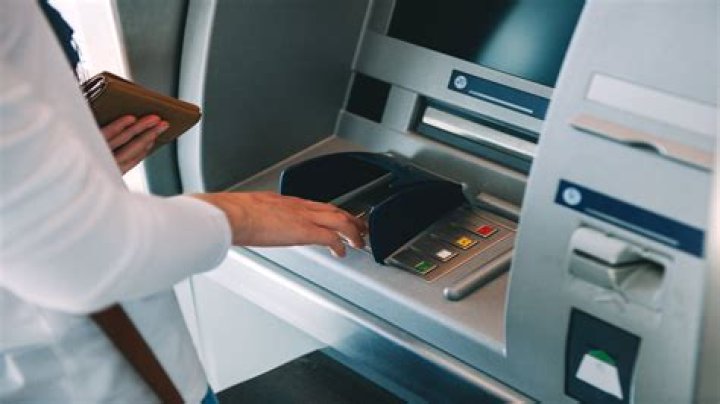 How does a bank teller use a computer?